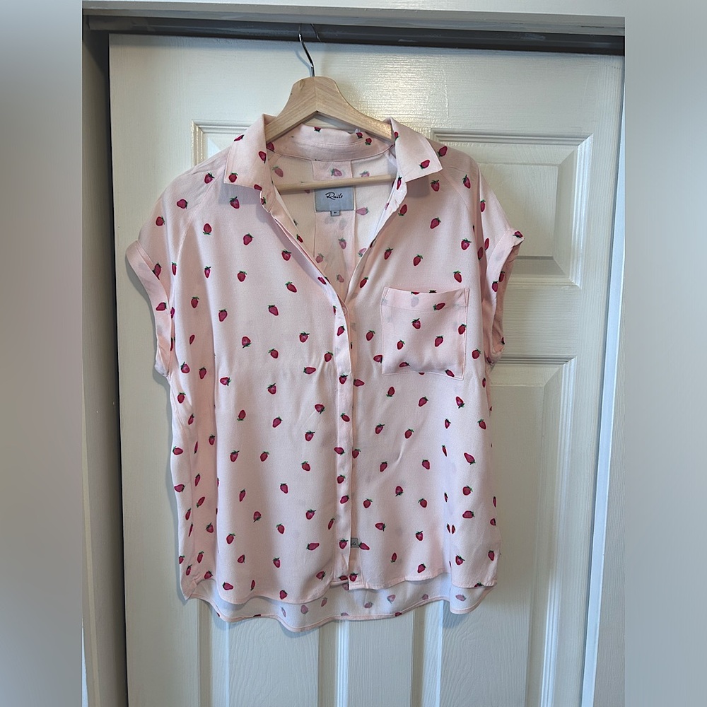 Button-up, light-pink blouse with strawberry print